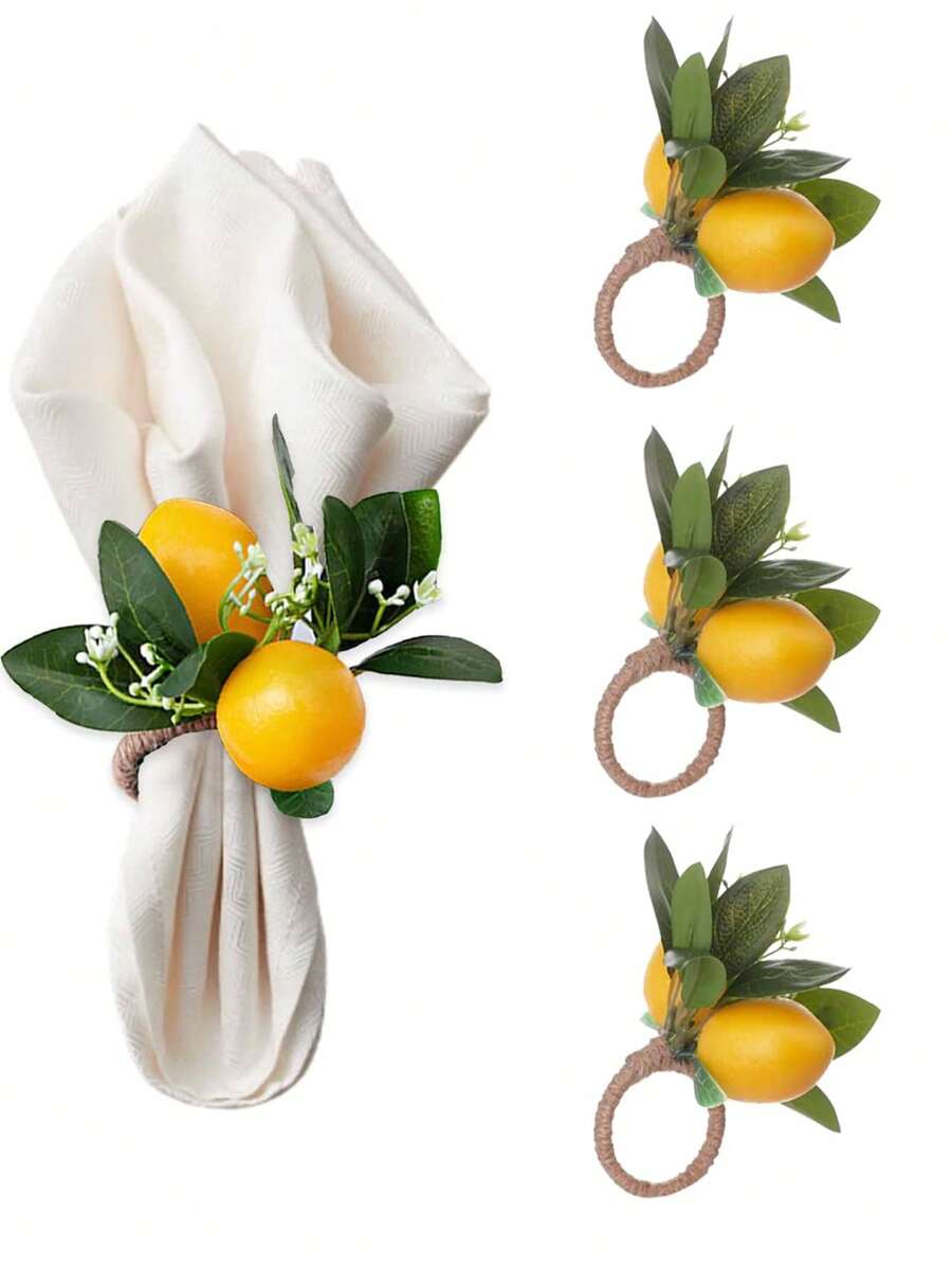 Anel para guardanapo elegante com flores e frutas decorativas.