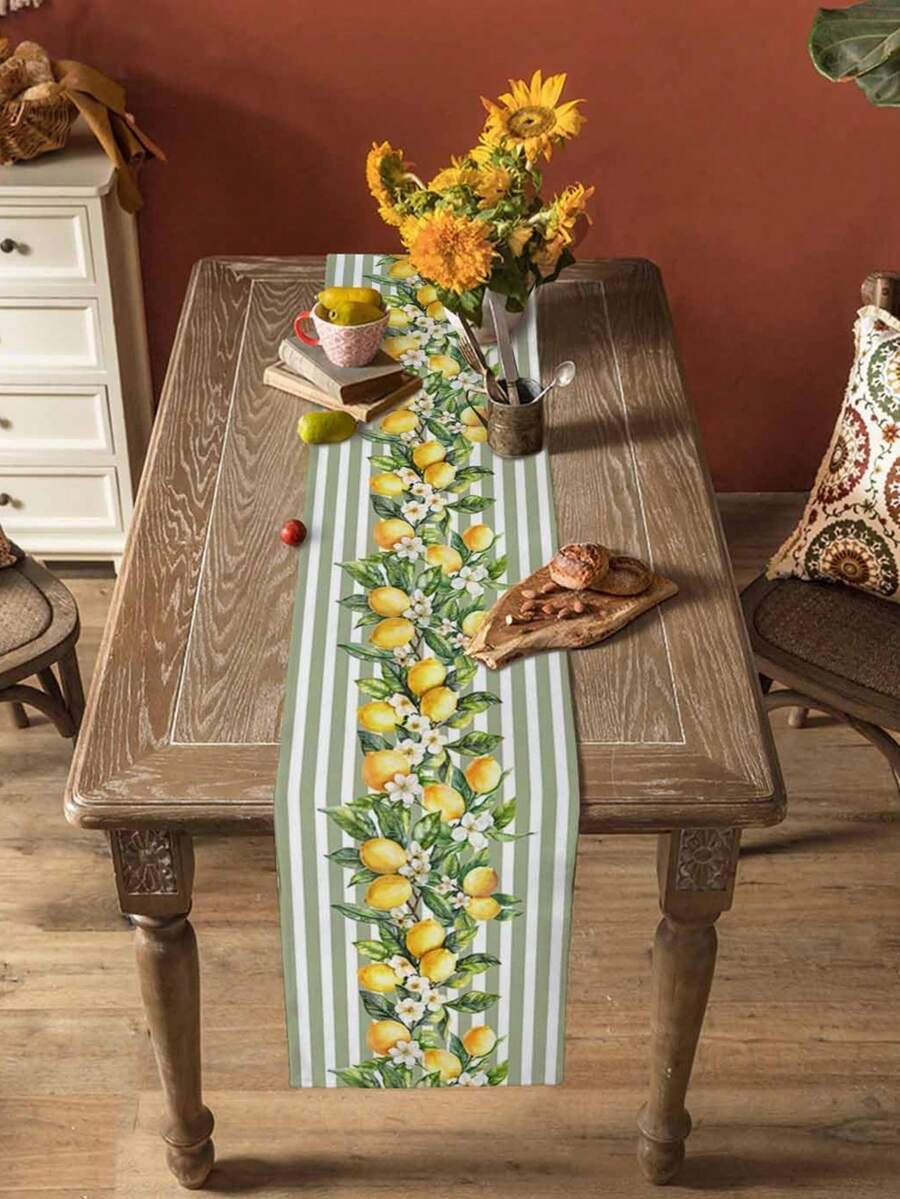 Mesa posta elegante com corredor de mesa estampado em tema limões sicilianos.